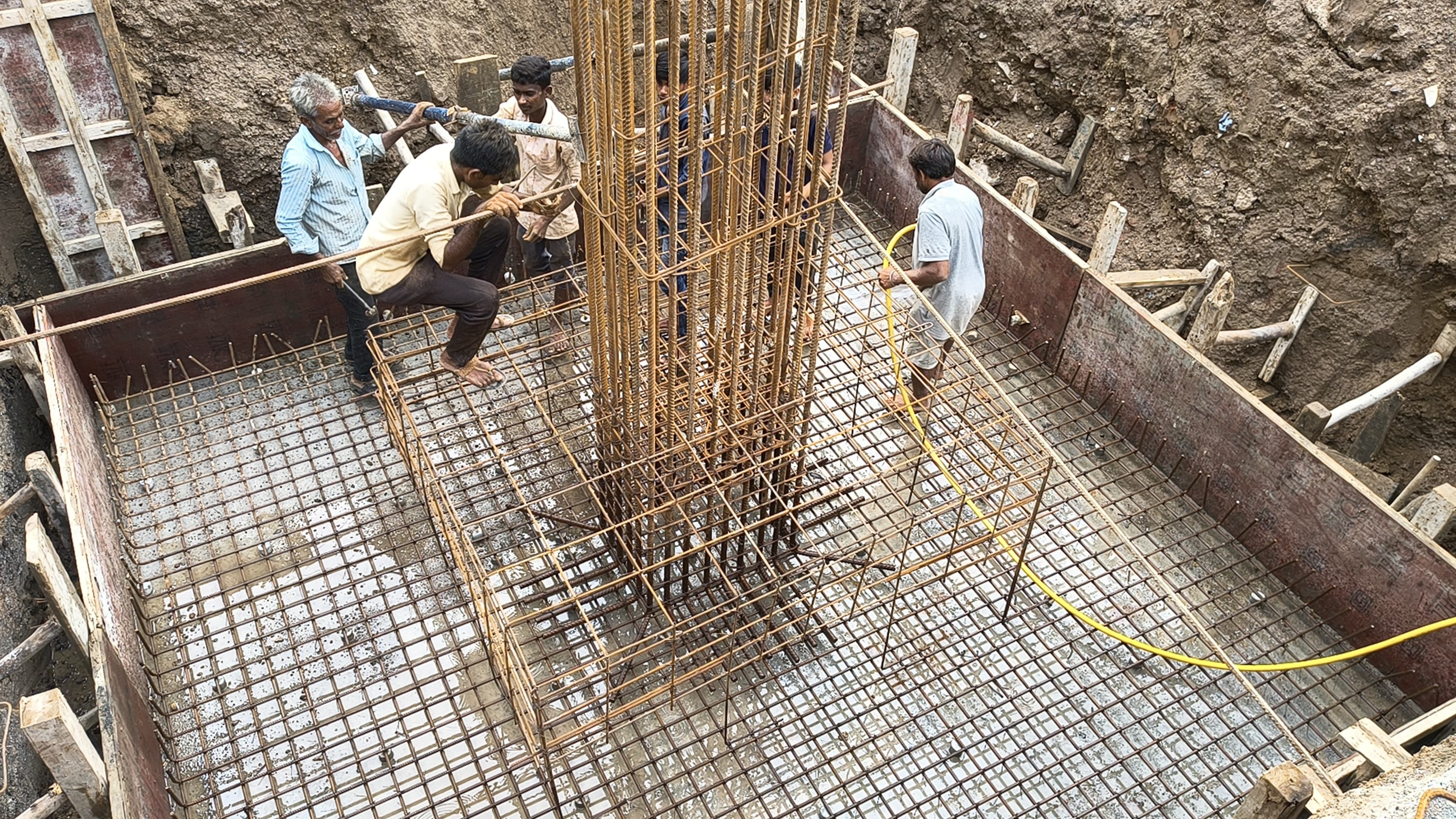 RCC column and foundation work during structural construction in Surat