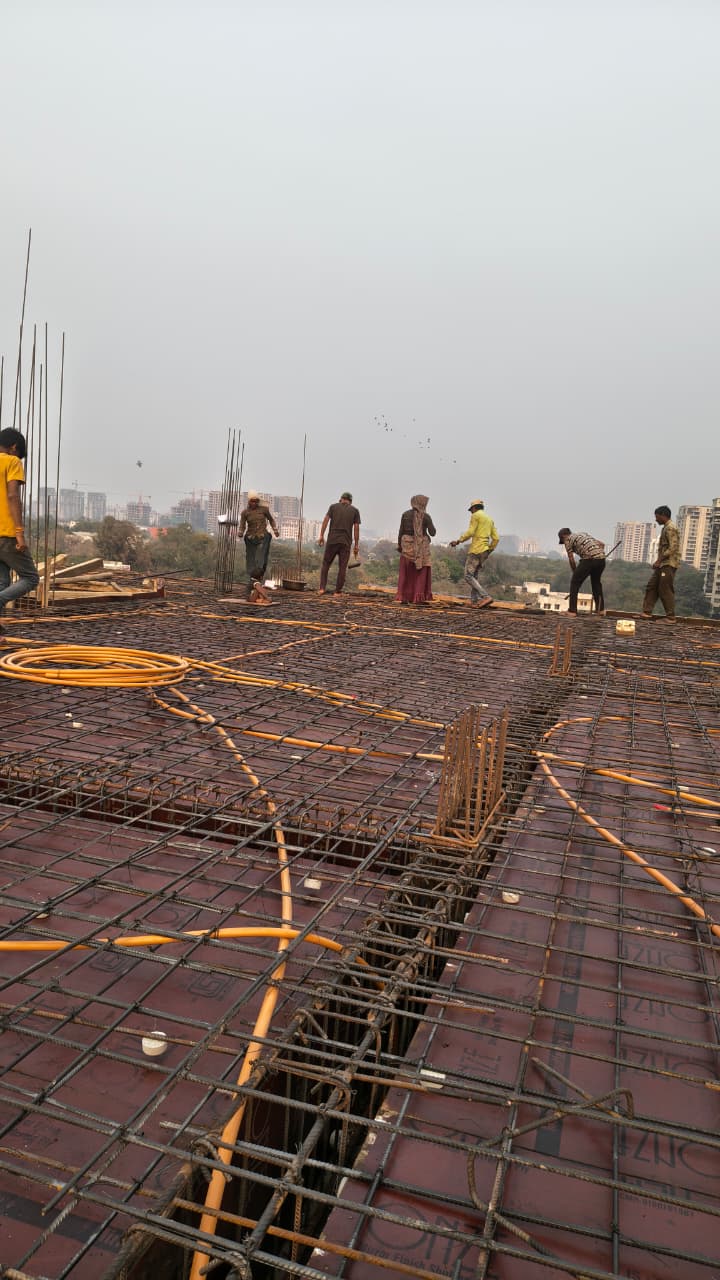 Construction Management - Wide view of RCC slab casting and rebar work at Highstaand Infraa project site